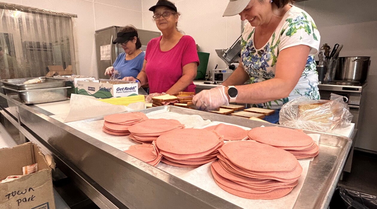 Staff prepare lunches for the Fieldstone Foundation Summer Food Service Program.